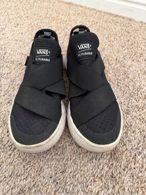 Vans Ultrarange Slip-On Sneakers in Black and White